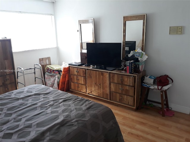 bedroom featuring light wood-type flooring