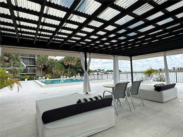 view of patio / terrace featuring a community pool