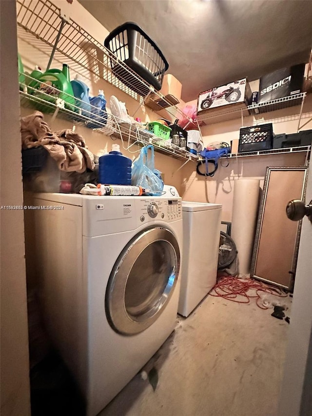 laundry area featuring independent washer and dryer