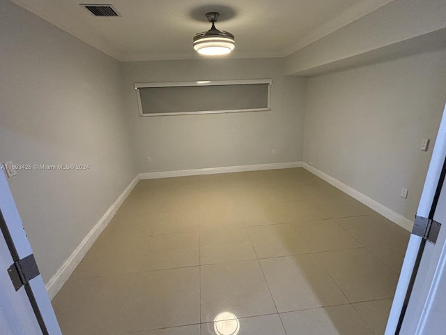 spare room with tile patterned flooring