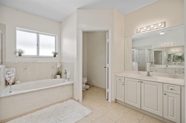 full bathroom featuring tile patterned flooring, vanity, toilet, and plus walk in shower