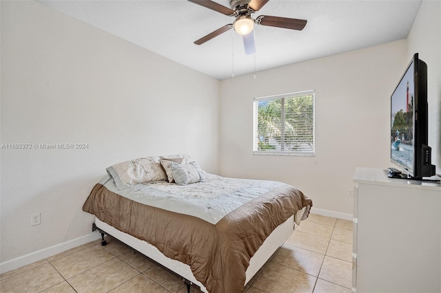 bedroom featuring ceiling fan and light tile patterned floors