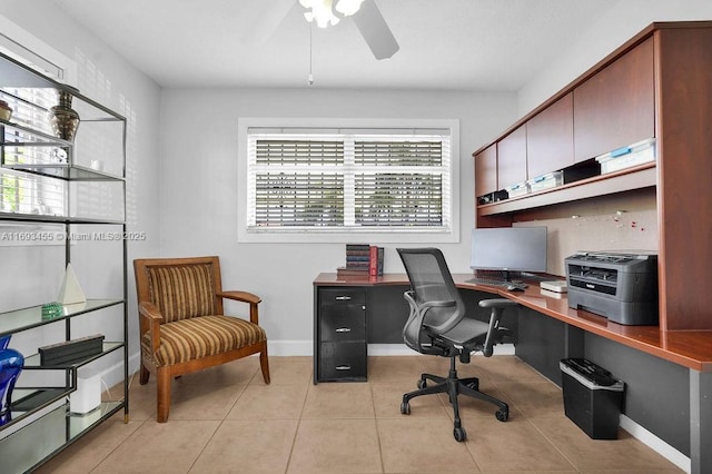 home office with ceiling fan, light tile patterned floors, and plenty of natural light