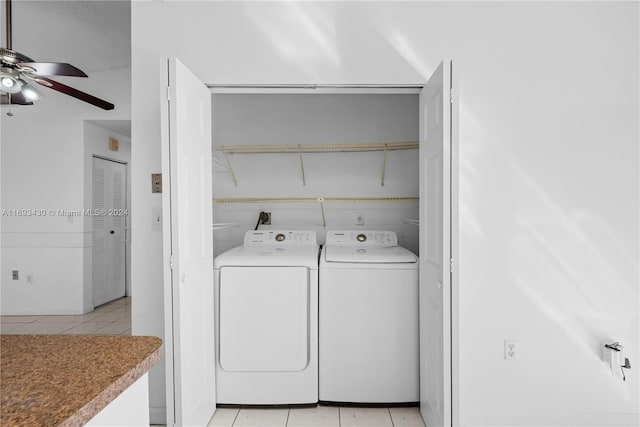 laundry area with ceiling fan, light tile patterned flooring, and independent washer and dryer