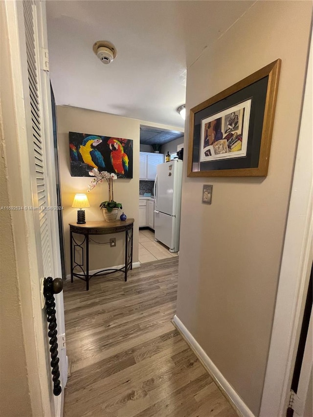 hallway featuring hardwood / wood-style floors