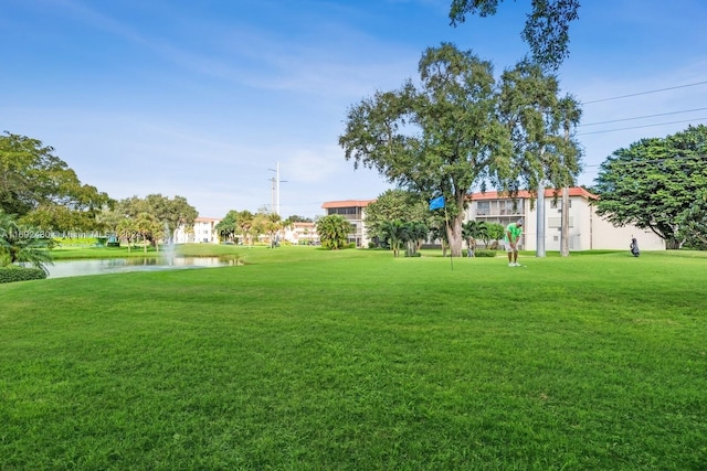 view of yard with a water view