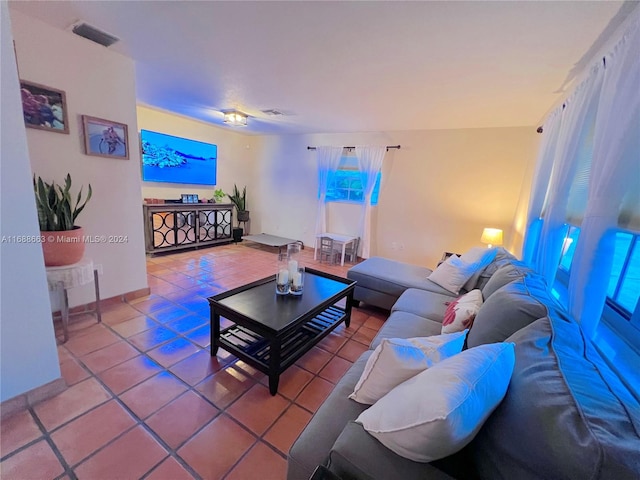 living room featuring tile patterned floors