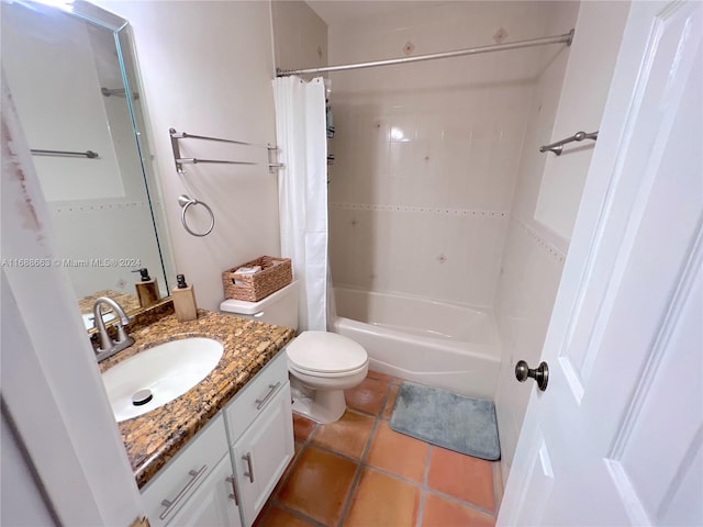 full bathroom featuring vanity, tile patterned floors, toilet, and shower / tub combo