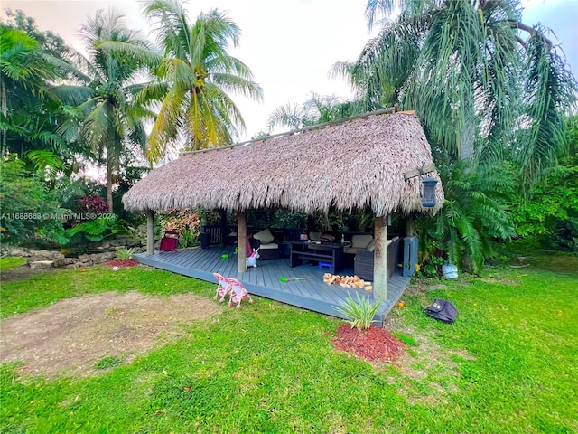 exterior space featuring a deck and a gazebo