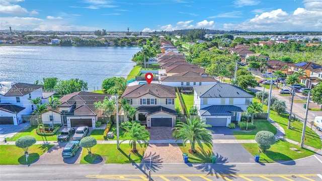 drone / aerial view with a water view