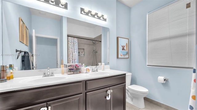 bathroom featuring walk in shower, tile patterned flooring, vanity, and toilet