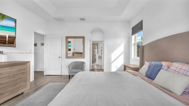 bedroom with light hardwood / wood-style flooring