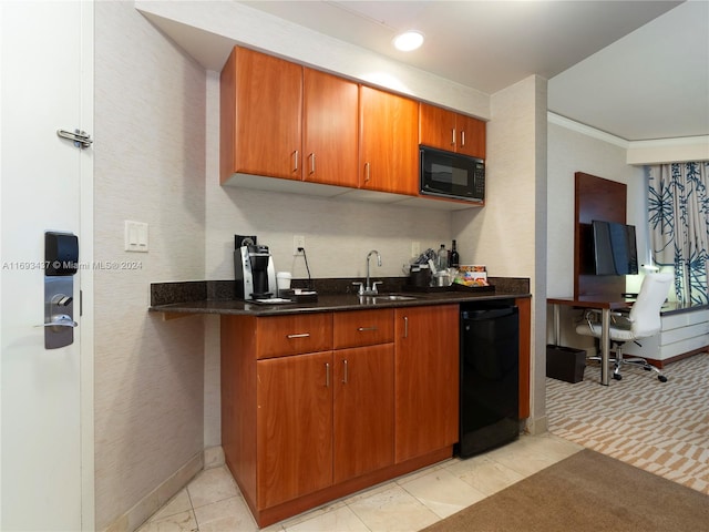 kitchen with black appliances, ornamental molding, and sink