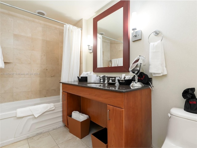 full bathroom with tile patterned flooring, vanity, toilet, and shower / bathtub combination with curtain