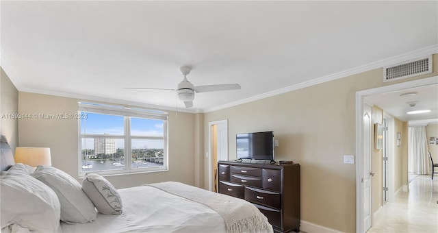 bedroom featuring ceiling fan and ornamental molding