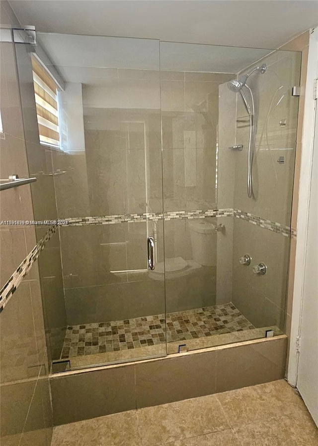 bathroom with an enclosed shower