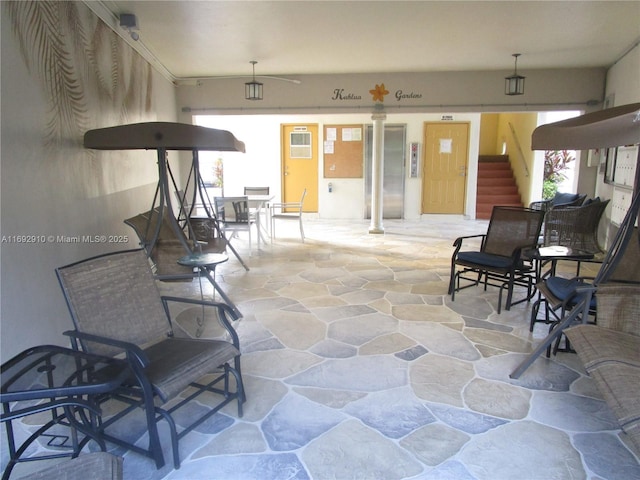 view of patio / terrace with elevator