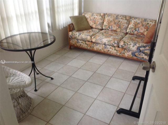 living room with light tile patterned floors