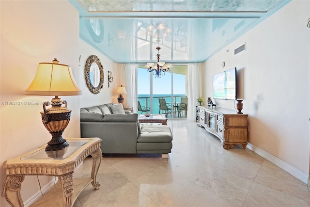 living room featuring a chandelier