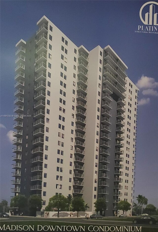 view of outdoor building at dusk