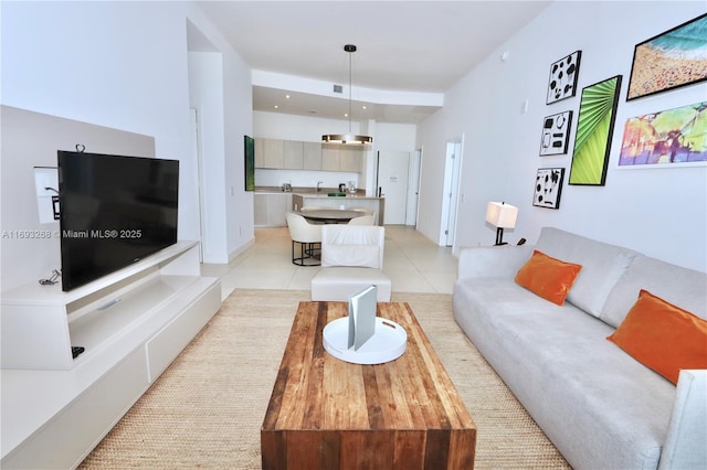 living area featuring light tile patterned floors