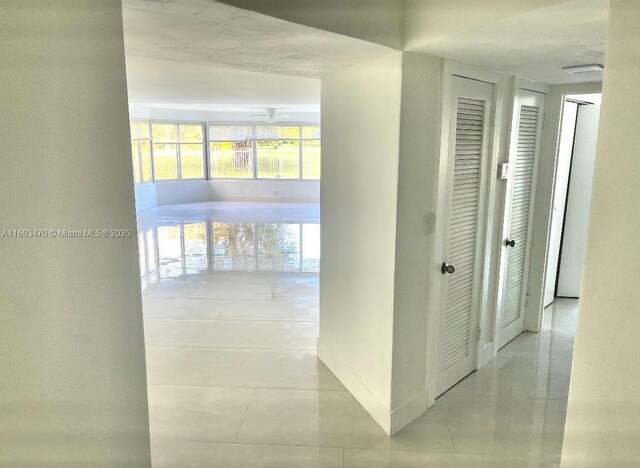 kitchen featuring white cabinetry, sink, and appliances with stainless steel finishes