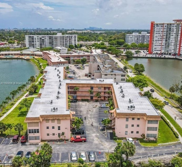 aerial view featuring a water view and a city view