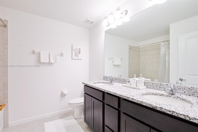 bathroom featuring tile patterned flooring, vanity, toilet, and a shower with shower curtain