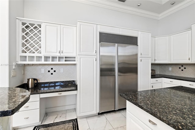 2939 Paddock Ln, Weston, FL 33331 - kitchen featuring stainless steel built in fridge, ornamental molding, light marble finish floors, white cabinetry, and tasteful backsplash