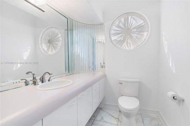 2939 Paddock Ln, Weston, FL 33331 - bathroom with marble finish floors, baseboards, toilet, and vanity