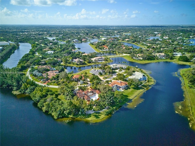 bird's eye view with a water view and a residential view