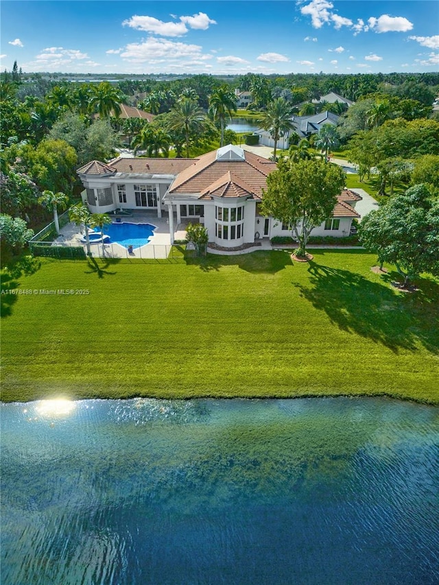 birds eye view of property featuring a water view