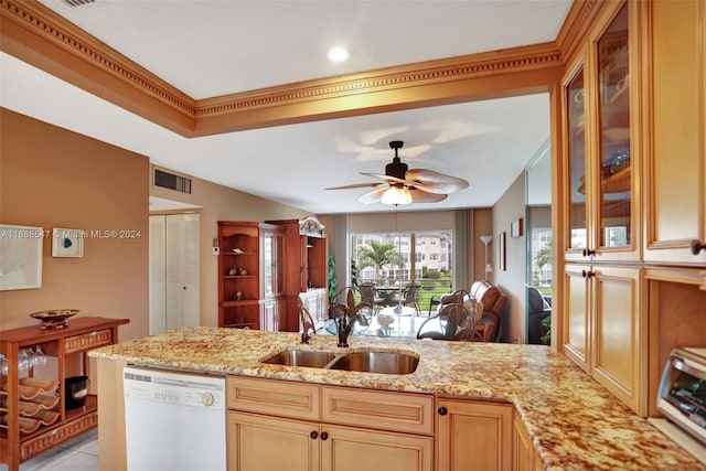 kitchen with kitchen peninsula, white dishwasher, ceiling fan, and sink