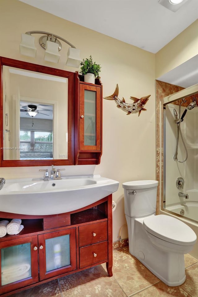 full bathroom with shower / tub combination, vanity, toilet, tile patterned flooring, and ceiling fan