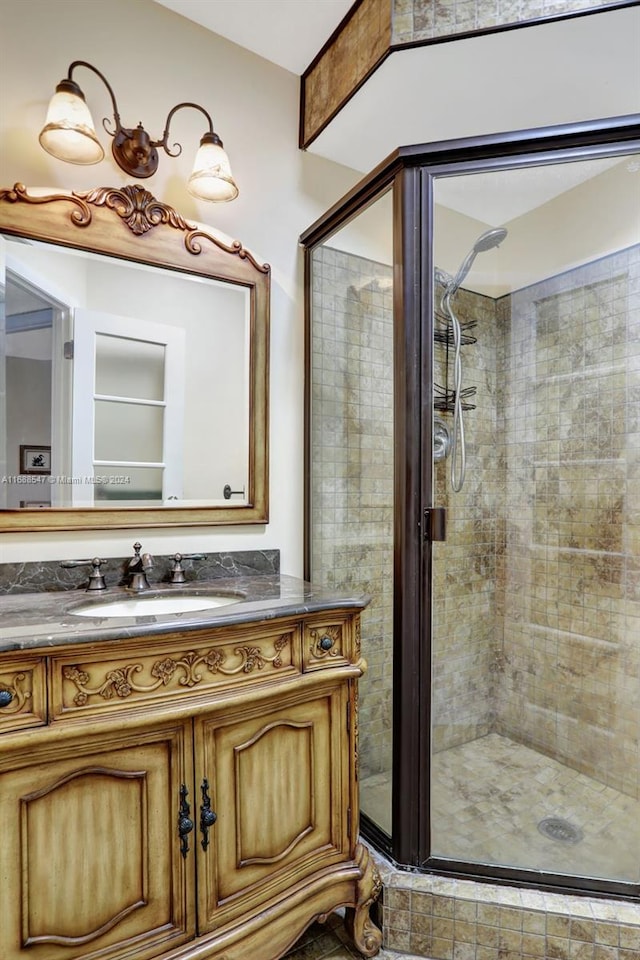 bathroom with vanity and walk in shower