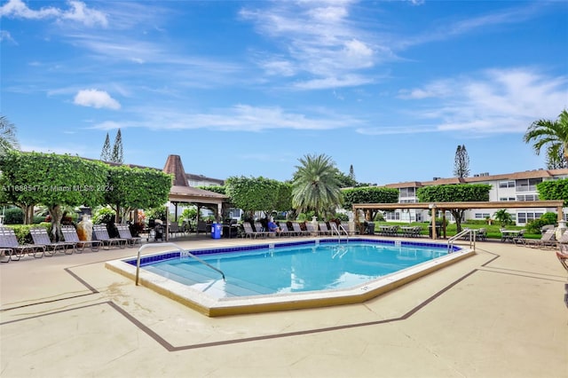 view of pool with a gazebo and a patio