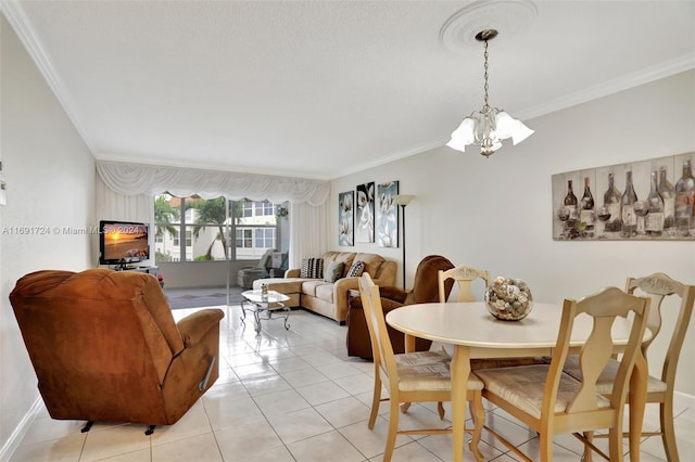 dining area with light tile patterned floors, crown molding, and a notable chandelier