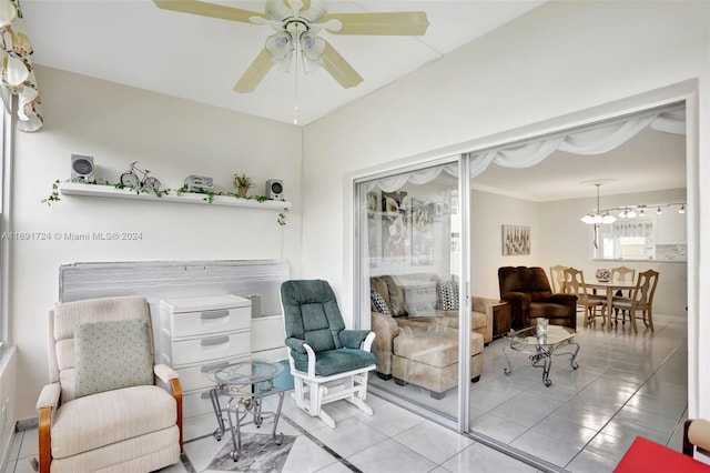 interior space featuring ceiling fan and light tile patterned floors