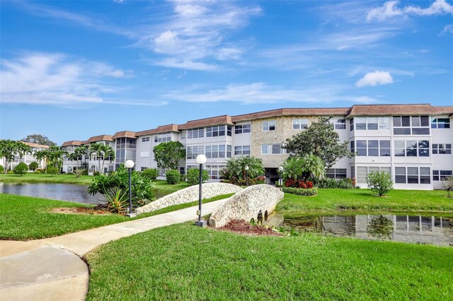3501 NW 47th Ave Unit 515, Lauderdale Lakes, FL 33319 - view of property featuring a water view and a residential view