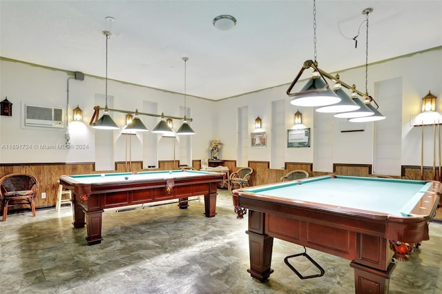 playroom with billiards, a wall unit AC, and wood walls