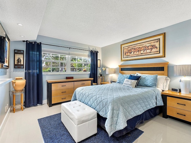 bedroom featuring a textured ceiling