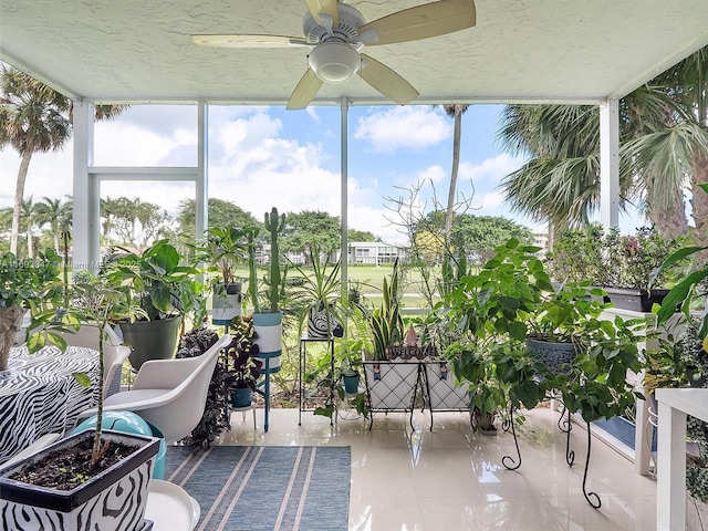 sunroom / solarium with ceiling fan