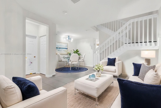 living room with tile patterned flooring