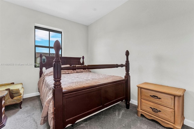 bedroom featuring dark colored carpet