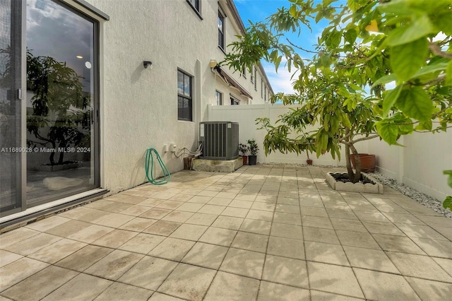 view of patio with central AC