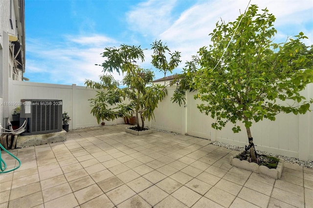 view of patio with central AC unit