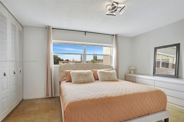 3501 NW 47th Ave Unit 504, Lauderdale Lakes, FL 33319 - bedroom with a closet and baseboards