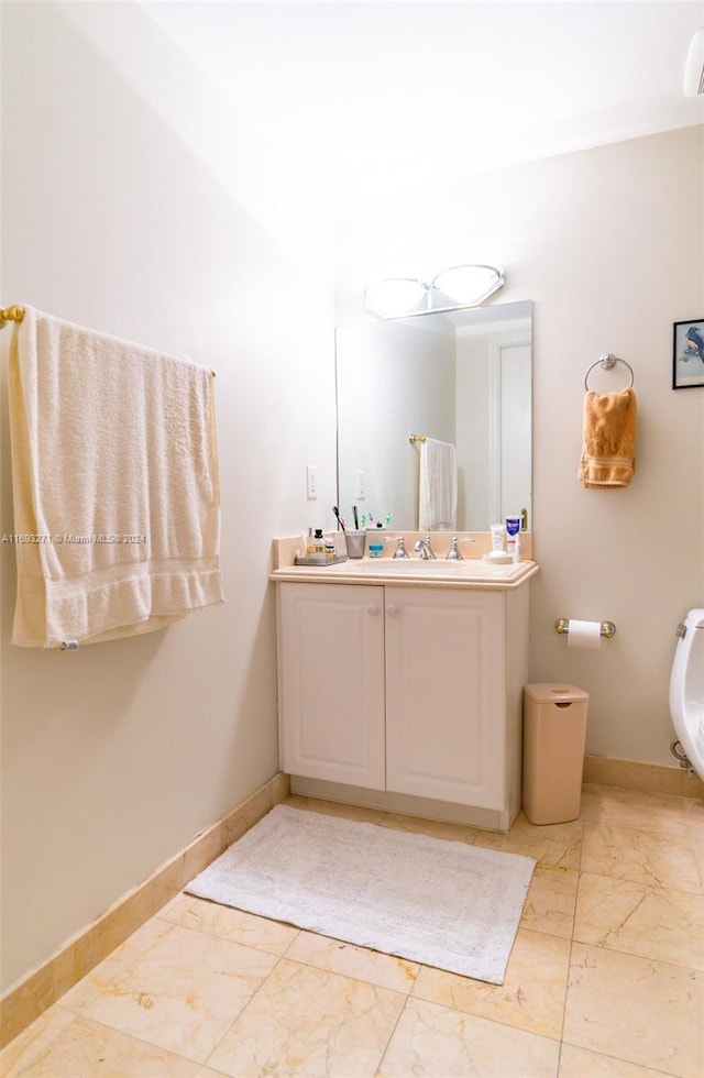 9595 Collins Ave Unit N9-C, Surfside, FL 33154 - bathroom with marble look tile flooring and vanity
