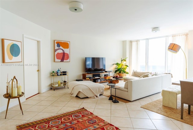 living room featuring light tile patterned flooring