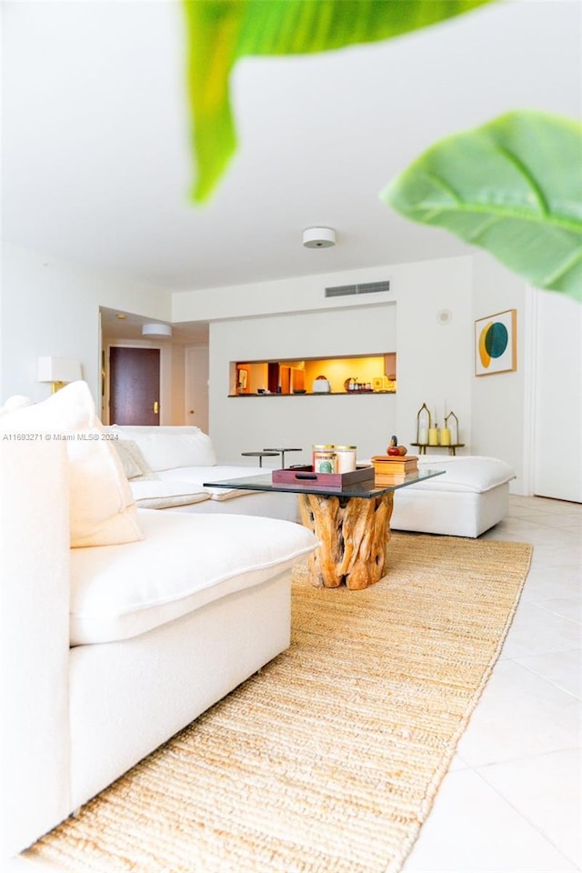 living room featuring tile patterned floors